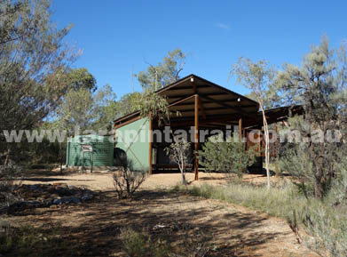 The Larapinta Trail trailhead and water tank at Birthday Waterhole (S4/5 Junction)